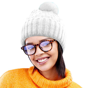 White Fleece Lining Solid Knit Faux Fur Pom Pom Beanie Hat, Stay warm and stylish this season with this hat. This classic hat is perfect for gifting, crafted with a solid knit and lined with soft fleece to provide superior warmth and comfort on cold days. Perfect winter accessory for outdoor activities.