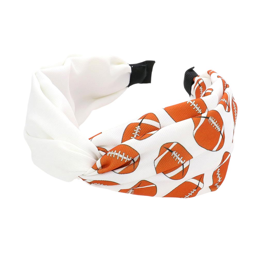 White Game Day Football Patterned Twisted Headband, Stay stylish and comfy with this Headband. This headband is designed with a soft fabric material for comfort and is patterned with an eye-catching football design for a game-day-ready look. Attend your team's play with this  Football Patterned Twisted Headband. 
