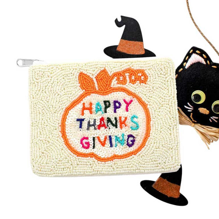 White-HAPPY THANKSGIVING Message Seed Beaded Mini Pouch Bag, This mini bag is handcrafted with intricate beadwork and features a bold "HAPPY THANKSGIVING" message on the front. Perfect for storing your essentials while spreading some festive cheer. Happy Thanksgiving! 