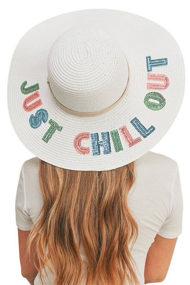 White JUST CHILL OUT Sequin Letter Floppy Hat combines practical sun protection with statement style. The wide-brimmed silhouette offers optimal shade while the sequin lettering delivers a distinctive fashion element. Crafted with quality materials for durability, this versatile accessory transitions seamlessly from beach outings to festival wear, elevating casual ensembles with its relaxed yet refined aesthetic. 