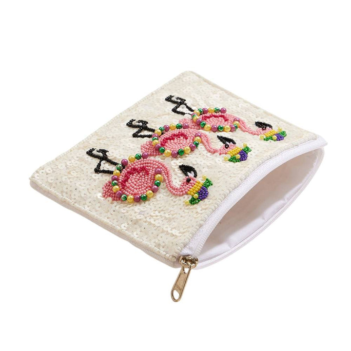 White-Mardi Gras Flamingo Sequin Pearl Ball Seed Beaded Mini Pouch Bag is perfect for adding a touch of fun and flair to any outfit. Its colorful sequins and beaded design make it a standout accessory, while its compact size allows for easy carrying. Enjoy the beauty and functionality of this unique bag. 