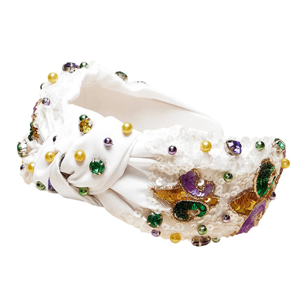 White-Mardi Gras Sequin Fleur de Lis Stone Embellished Knot Headband is the perfect accessory for any Mardi Gras celebration. Featuring sparkling sequins and a stunning embellished fleur de lis design, this headband is sure to turn heads. Keep your hair in place while adding a touch of glamour to your outfit.