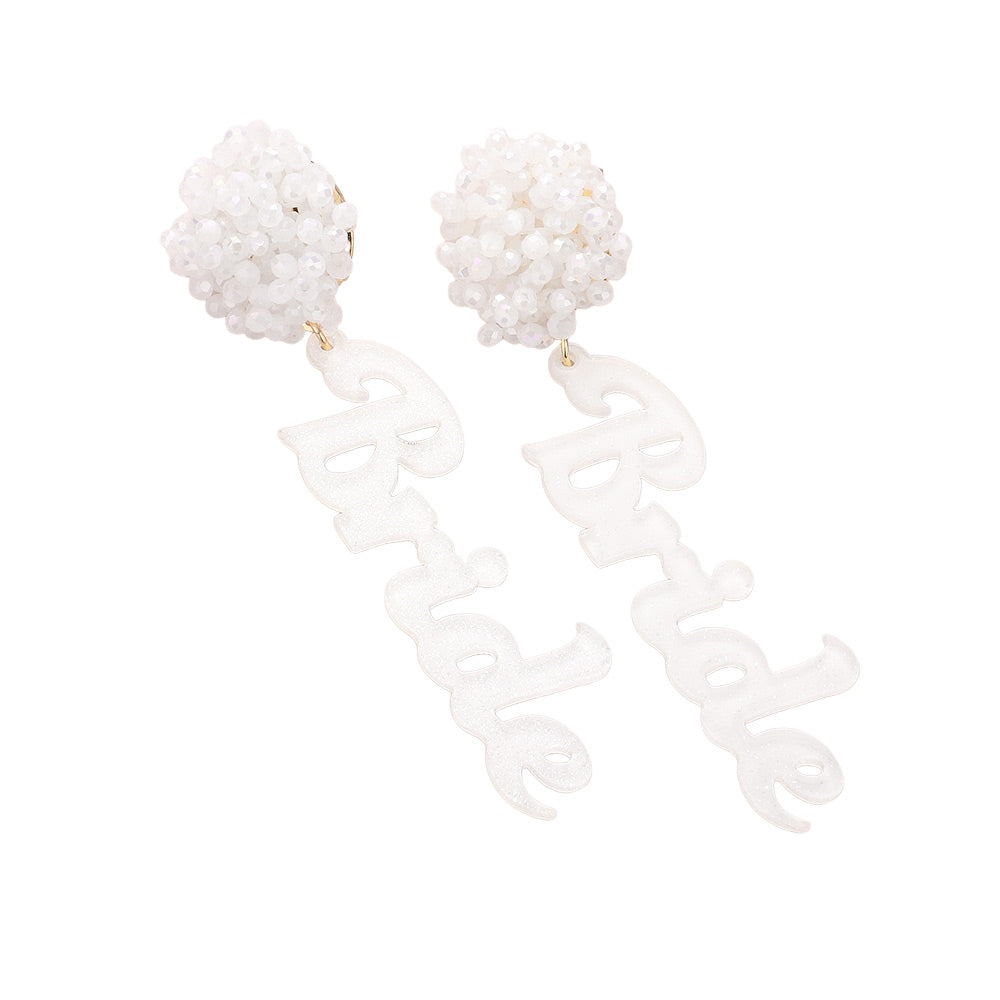 White-Pearl Beaded Cluster Resin BRIDE Message Dangle Earrings, Get ready to walk down the aisle in style with our earrings! These playful and quirky earrings feature a delicate cluster of pearls and a fun 'BRIDE' message, perfect for adding a touch of whimsy to your wedding day look. Say 'I do' to these unique earrings!