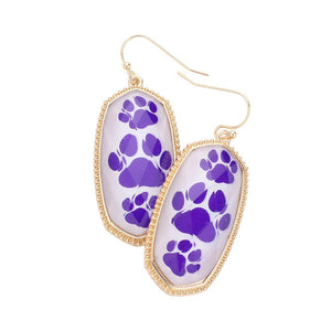 White Purple Adorned with three paw shapes, the Game Day Triple Paw Pointed Hexagon Dangle Earrings make a striking statement. These earrings feature a unique hexagon design and crafted from high-grade alloy, ensuring long-lasting wear and durability. Make a statement while supporting your favorite team with these trendy earrings.