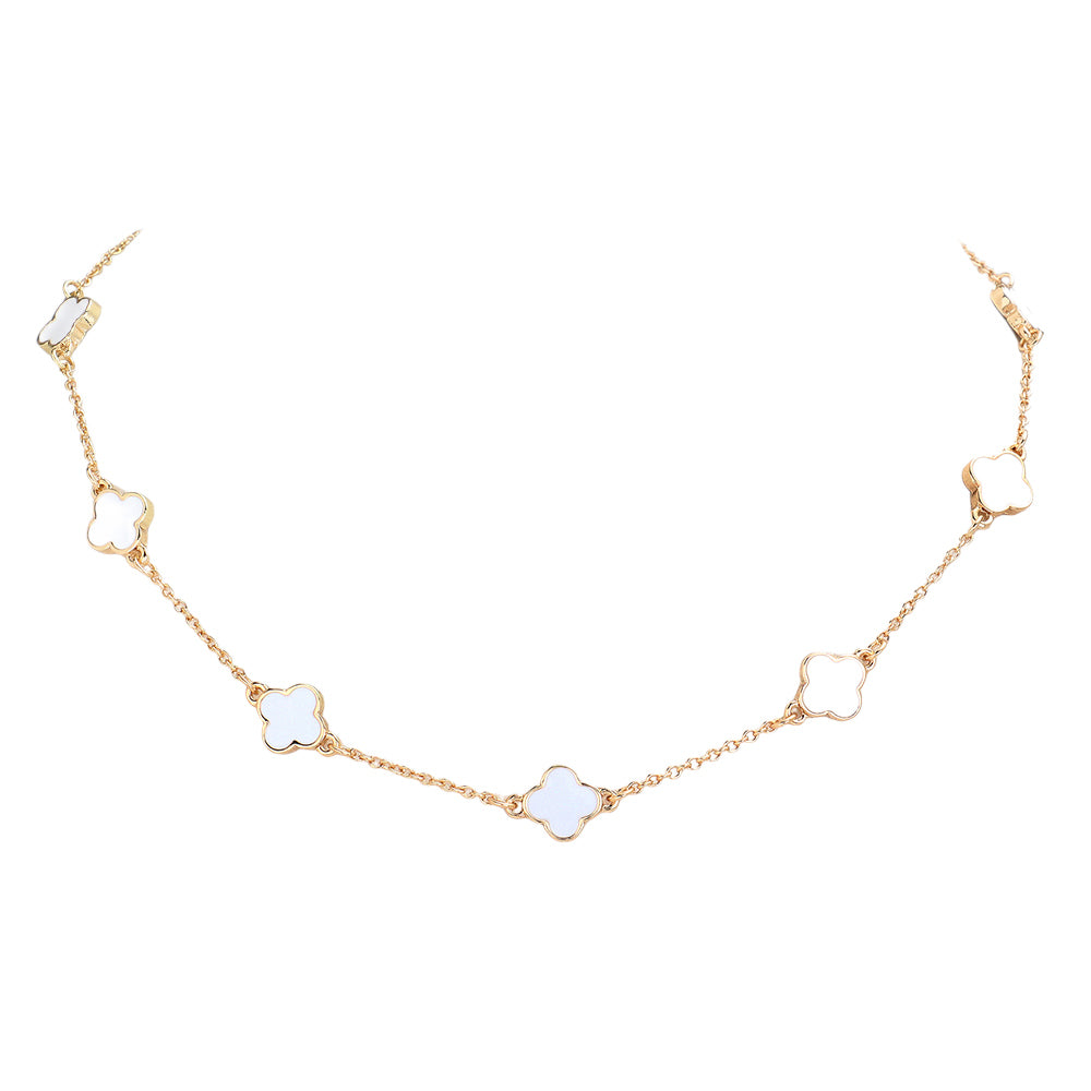 White Quatrefoil Station Necklace is a sophisticated and timeless piece to elevate any outfit. Crafted with our unique quatrefoil design, this necklace is perfect for everyday wear or special occasions. Made with high-quality materials, it's a must-have staple for any jewelry collection.