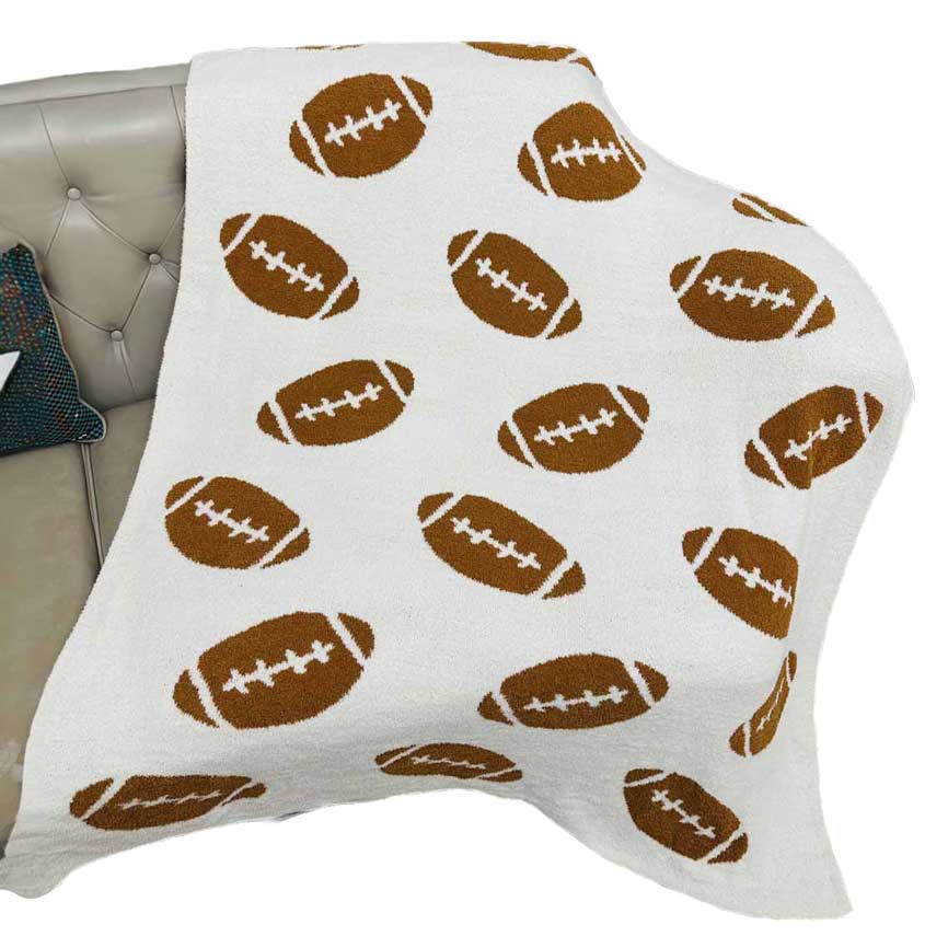 White Reversible Football Patterned Throw Blanket, is the perfect addition to your home décor and it's great for football fans! It offers two different football-inspired patterns. Enjoy cozy nights in with this reversible blanket and you won't have to miss any of the action on the field. Ideal gift for football lovers.
