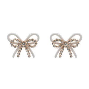 White Rhinestone Paved Color Metal Wire Bow Earrings are a stylish and elegant addition to any outfit. The intricate design and sparkling rhinestones add a touch of glamour, while the metal wire construction ensures durability. Perfect for any occasion, these earrings are a must-have for any fashion-savvy individual.
