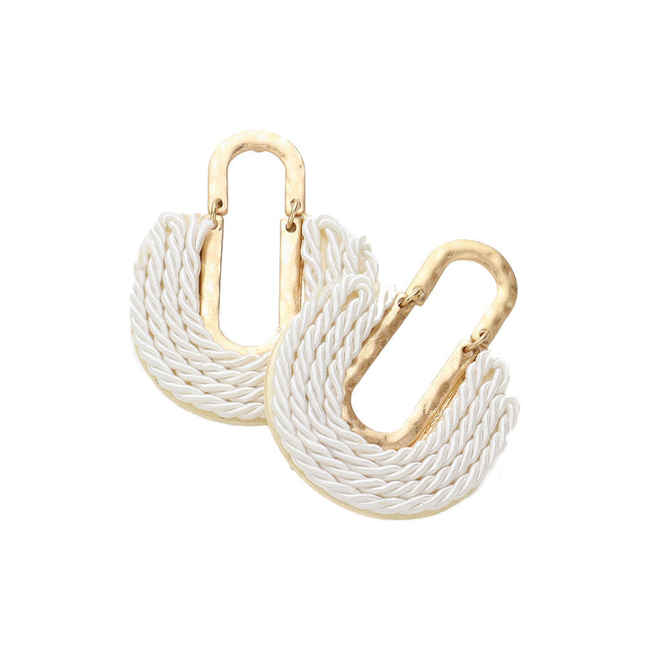 White-Rope Embellished Abstract Earrings, Unique and modern design that is sure to elevate any outfit. The intricate rope detailing adds a touch of elegance, while the abstract shape makes a bold statement. Made with high-quality materials, these earrings are lightweight and comfortable for all-day wear. 