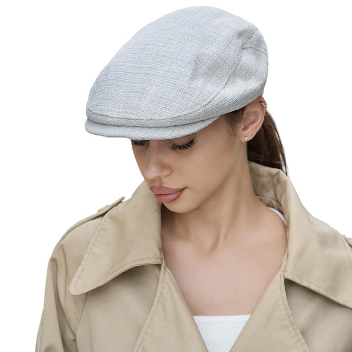 White-Solid Color Beret Hat is the perfect accessory for adding a touch of sophistication to any outfit. The solid color design adds a classic and elegant look, while the beret style provides a unique and trendy edge. Made with high quality materials, this hat will keep you stylish and warm all season long.  