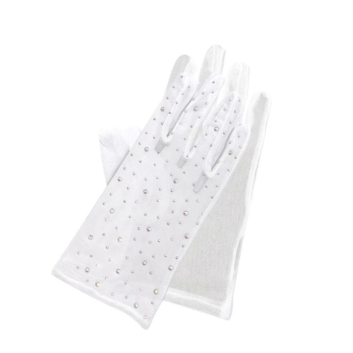 White-Stone Embellished Mesh Dressy Wedding Gloves are the perfect accessory for any bride-to-be. The delicate mesh design is adorned with sparkling stones, adding a touch of elegance to your special day. The gloves provide a classic and stylish look, while also keeping your hands warm during outdoor ceremonies.