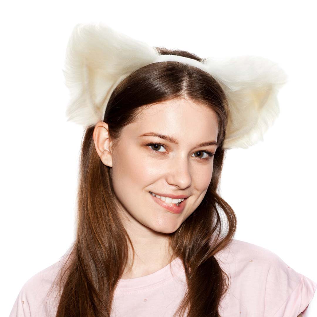 White Trendy Faux Fur Animal Ear Headband, push back your hair with this pretty headband, and add a pop of color to any plain outfit! This is beautifully designed with an animal theme that will make a glowing touch on everyone. This is the perfect gift for Halloween, especially for your friends, family, and your love.