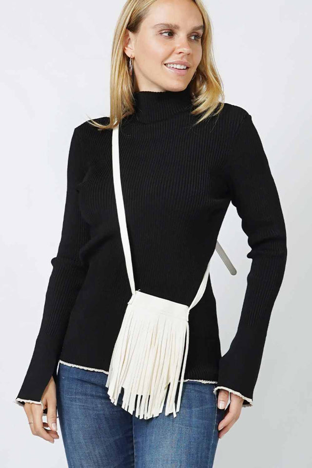 White Compact and stylish, this fringe mini crossbody bag is the perfect accessory for on-the-go moments. Crafted from durable 100% polyester, it features playful fringe detailing that adds movement and personality to any outfit. The adjustable crossbody strap keeps your hands free while you navigate your day. One size fits all, making it an easy grab-and-go essential for casual outings, festivals, or weekend adventures.