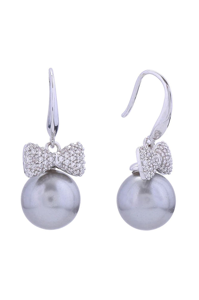 White Gold Elegant bow-shaped post earrings featuring lustrous pearl drops, crafted in 14K gold or white gold plating. Each earring measures 3cm in diameter and combines brass with pearl and cubic zirconia accents for timeless sophistication. Hypoallergenic construction ensures comfortable all-day wear, while lead and nickel compliance guarantees safety for sensitive skin. 