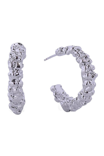 White Gold Elevate your everyday look with these stunning 14K Gold/White Gold Dipped Crinkled Hoop Post Earrings. Crafted from hypoallergenic brass, these beautifully textured hoops feature a delicate crinkled finish that catches the light beautifully. With a comfortable 2.1cm diameter, they're the perfect size for versatile styling dress them up or down with ease. Designed with sensitive skin in mind, these earrings are lead and nickel compliant, ensuring safe, all-day wear.
