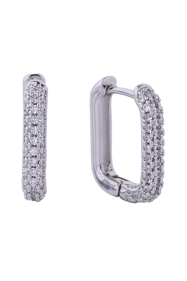 White Gold Elevate your everyday look with these stunning 14K Gold/White Gold dipped huggie earrings. Crafted from hypoallergenic brass and adorned with sparkling cubic zirconia pavé detailing, these delicate hoops offer timeless elegance with a modern edge. At just 1.4cm in diameter, they sit perfectly close to the ear for a refined, understated aesthetic. Designed with sensitive skin in mind, they're lead and nickel compliant for worry-free wear.