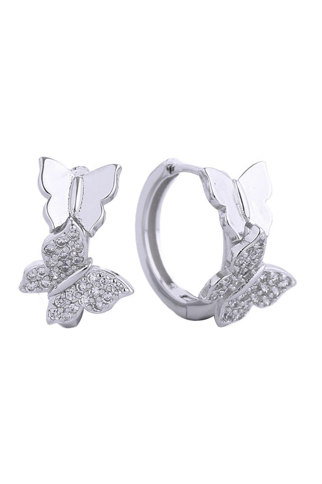 White Gold Elegant huggie hoop earrings featuring a luxurious 14K gold and white dip finish. Adorned with sparkling cubic zirconia pavé detailing for a sophisticated sparkle. Crafted from hypoallergenic brass, these earrings are gentle on sensitive skin and compliant with lead and nickel standards. The compact 2.03cm diameter offers a comfortable, everyday wear option that transitions seamlessly from casual to formal occasions. A timeless addition to any jewelry collection.