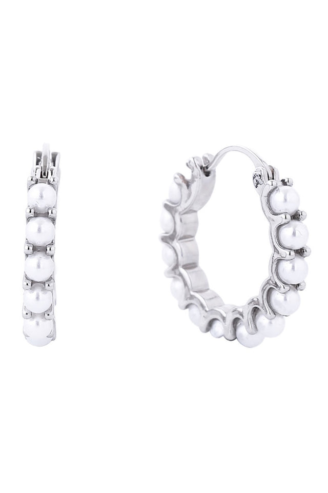 White Gold Elegant hoop earrings featuring lustrous white pearls with a luxurious 14K gold dip finish. Crafted from hypoallergenic brass, these 2.29cm diameter hoops are perfect for sensitive skin. The secure pin catch closure ensures they stay in place throughout your day. Lead and nickel compliant for safe, worry-free wear. A timeless addition to any jewelry collection.