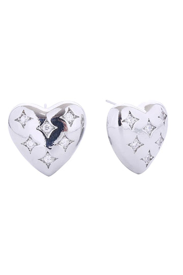 White Gold Elevate your everyday look with these charming 14K Gold/White Gold Dipped Puffy Heart Post Earrings. Crafted from quality brass and adorned with sparkling cubic zirconia, these delicate studs offer timeless elegance with a modern twist. At just 2cm, they're the perfect size for subtle sophistication. The hypoallergenic design ensures comfort for sensitive ears, while lead and nickel compliance guarantees safety and peace of mind.