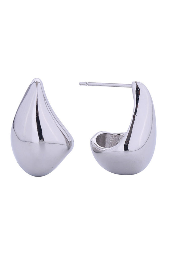 White Gold Elegant raindrop-shaped post earrings crafted in brass with 14K gold or white gold dipping. These delicate 1.8cm earrings combine timeless style with everyday wearability. Hypoallergenic design makes them perfect for sensitive skin, while lead and nickel compliance ensures safety and peace of mind. Expertly made in Korea, these versatile studs transition seamlessly from casual to formal occasions.