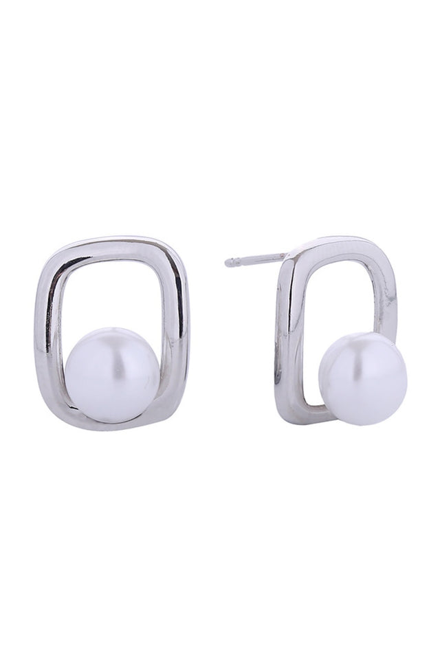White Gold Timeless square pearl studs with a luxe finish. Choose between warm 14K gold or cool white gold dipping over a durable brass base. Each earring showcases a lustrous pearl in a sophisticated 1.6cm square setting. Hypoallergenic design ensures comfort for sensitive ears. Lead and nickel compliant.