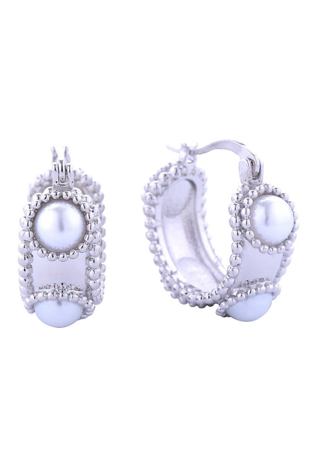 White Gold Elevate your jewelry collection with these 14K Vintage Pearl Pincatch Earrings, where classic charm meets contemporary comfort. Each earring features a lustrous pearl set in gold and white dipped brass, measuring 2.3cm in diameter for a refined, understated presence. Hypoallergenic construction protects sensitive skin, while Lead and Nickel Compliant certification guarantees safety and peace of mind. The vintage-inspired design transitions seamlessly from casual to formal settings, making these e