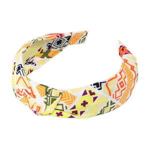 Yellow Aztec Patterned Burnout Knot Headband is expertly crafted and features a unique design. Its trendy Aztec pattern and comfortable knot design are perfect for adding a touch of style to any outfit. Made with high-quality materials, it provides both functionality and fashion.