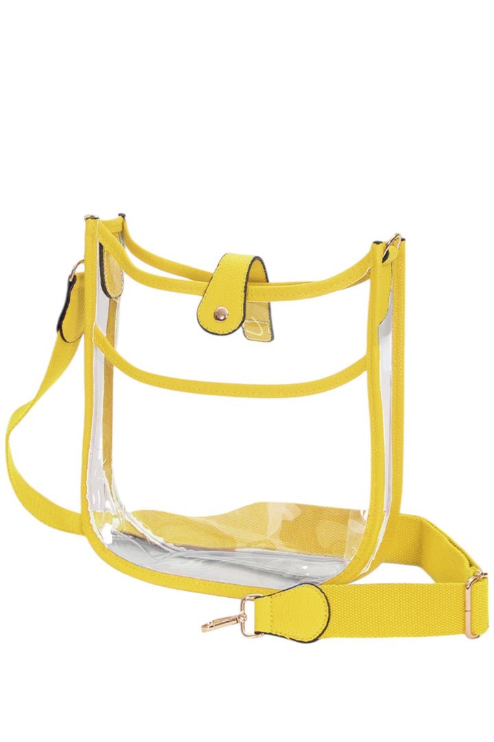 Clear Stadium Concert Crossbody Bag is expertly crafted to comply with strict venue security policies, featuring a fully transparent design for quick inspection. Its lightweight, durable construction ensures comfort and longevity, while the adjustable crossbody strap provides a secure, hands-free fit. Perfectly sized to hold essentials like tickets, phones, and wallets, this bag combines practicality with convenience for seamless access at concerts and stadium events.