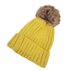 Yellow Solid Knit Faux Fur Pom Pom Beanie Hat, stay warm during the chilly months with this cozy pom pom beanie hat. This is the perfect hat for any stylish outfit or winter dress. Perfect gift item for Birthdays, Christmas, Stocking stuffers, Secret Santa, holidays, anniversaries, Valentine's Day, etc.