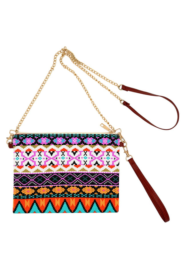 Aztec Crossbody & Wristlet Bag combines versatile functionality with distinctive design. Crafted for convenience, it transitions effortlessly from a hands-free crossbody to a sleek wristlet, ideal for on-the-go lifestyles. Its compact size accommodates essentials securely, while the Aztec-inspired pattern adds a unique, stylish touch. Perfect for those seeking both practicality and cultural flair in their everyday accessories. 