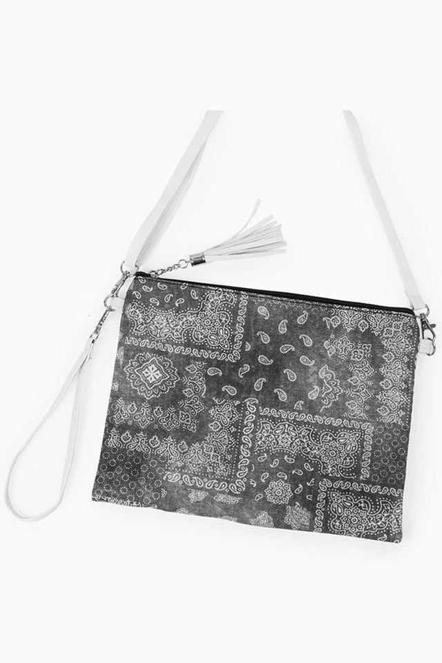 Bandana Crossbody Bag with Wristlet offers a sophisticated blend of practicality and style. Designed for versatility, it features a secure crossbody strap and a detachable wristlet, allowing seamless transition between hands-free and handheld use. Its durable construction ensures longevity, while the distinctive bandana pattern provides a unique aesthetic. Ideal for organizing essentials efficiently, this bag suits both everyday wear and travel needs with expert craftsmanship. 