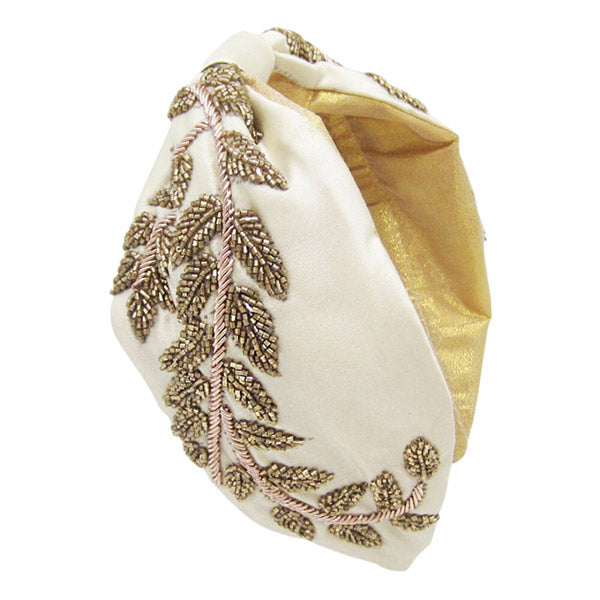 Introducing the Ivory Beige Neutral Beaded Leaf Cluster Knot Burnout Headband: look sharp with this seasonal statement piece! Featuring a boho-inspired burnout pattern and a cluster of beaded leaves, this headband will have you turning heads in no time. Perfect Birthday Gift, Christmas Gift, Regalo Cumpleanos, Regalo Navidad etc