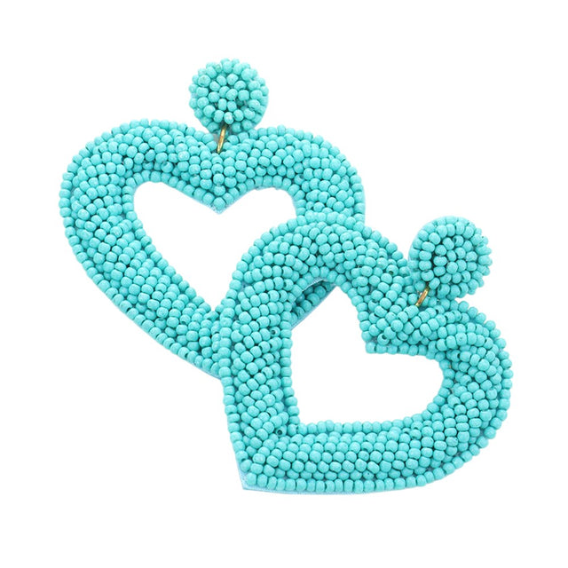 Turquoise Beaded Open Heart Drop Earrings! Made with stunning beads, these earrings add a touch of elegance to any outfit. Their open heart design symbolises love and vulnerability, making them the perfect gift for a loved one. Upgrade your jewelry collection with these beautiful and timeless earrings.