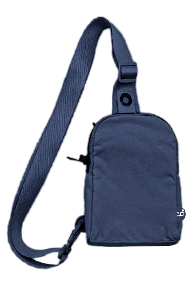 Navy C.C Double Pocket Sling Bag offers a practical and stylish solution for carrying essentials. Featuring two spacious pockets, it provides organized storage for your belongings while maintaining a sleek, compact design. Its adjustable sling strap ensures a comfortable fit for all-day wear, making it ideal for daily use or travel. Crafted with durable materials, this bag combines functionality with lasting quality. Perfect for those seeking convenience without compromising on style. 