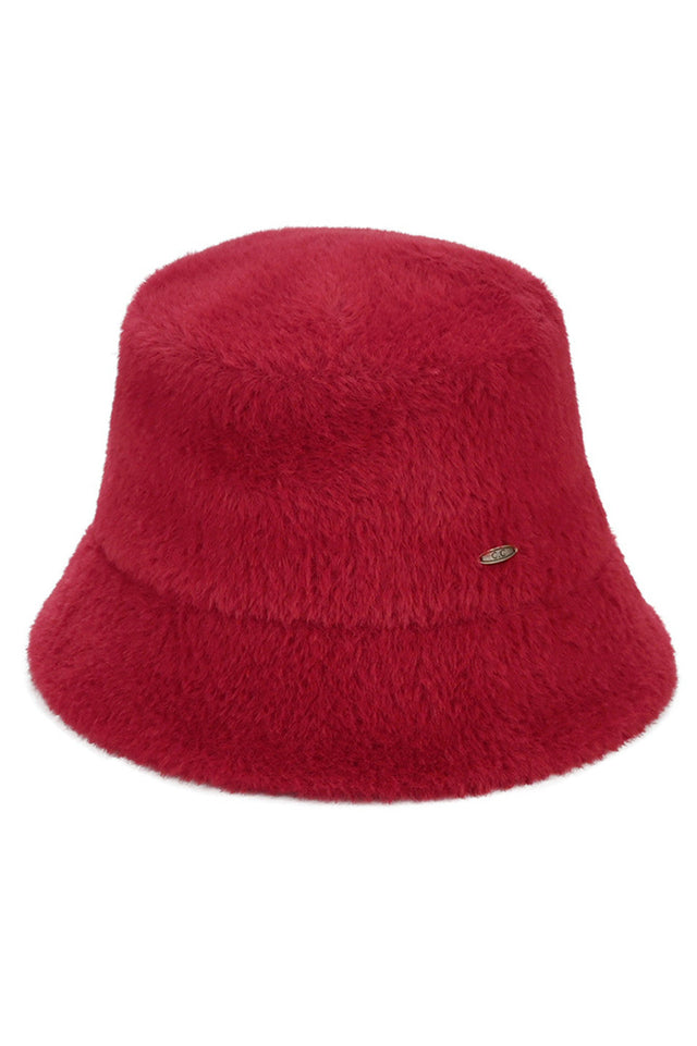 Burgundy C.C Solid Short Hair Faux Fur Winter Bucket Hat combines premium insulation with sophisticated style. The short-hair faux fur construction delivers exceptional warmth while maintaining a refined aesthetic. Expertly designed with a classic bucket silhouette, this hat provides optimal coverage during cold weather conditions while elevating your winter wardrobe with its luxurious texture and timeless appeal. 