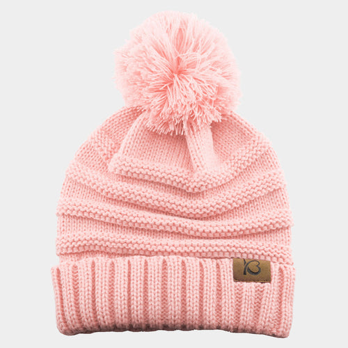 Gorro de punto trenzado con pompón grueso y canalé - Rosa