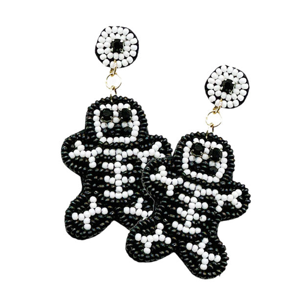 Flaunt your spooky style with these Felt Back Seed Beaded Skull Dangle Earrings! These bad boys feature a felt back and a seed beaded skull for maximum prowlin' power. Get ready to turn some heads and give 'em the ol' eye-sockets!