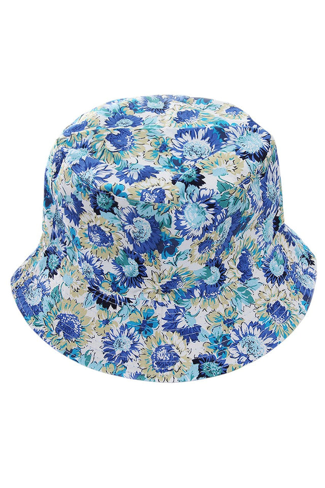 Blue FLORAL REVERSIBLE RAIN BUCKET HAT combines functionality with versatile style. Engineered with waterproof materials to provide superior protection during inclement weather, while offering two distinct looks in one accessory. The structured brim ensures optimal face coverage and water runoff, while the breathable interior maintains comfort during extended wear. An essential addition to any weather-ready wardrobe. 
