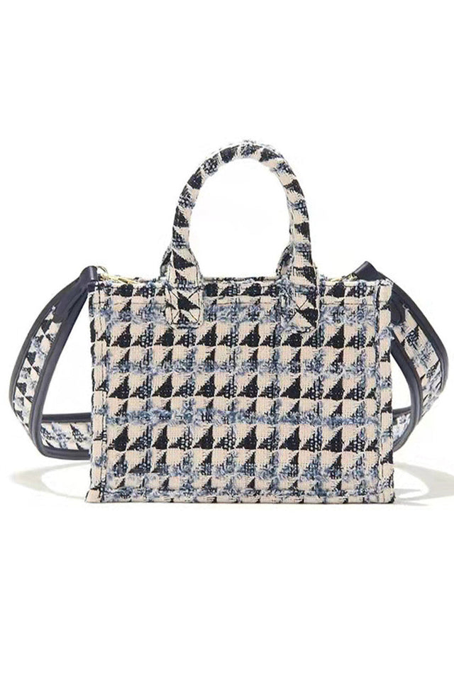 Denim Geometric Mini Tote Bag combines sleek design with practical functionality. Its compact size is perfect for carrying essentials while maintaining a modern, structured silhouette. Crafted with attention to detail, this tote offers durability and style, making it an ideal accessory for both casual outings and professional settings. Its geometric shape adds a contemporary edge, ensuring you stand out with understated sophistication.
