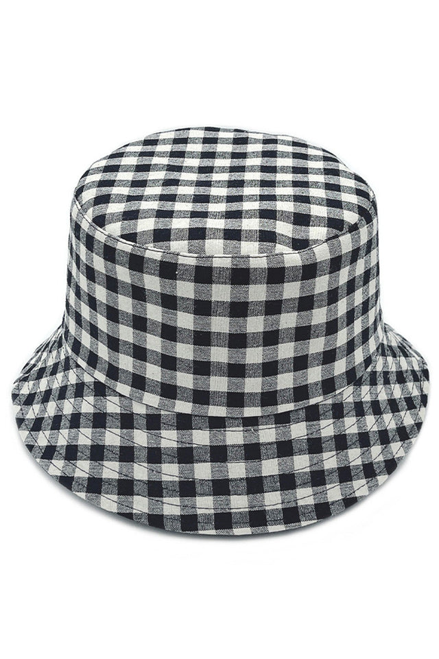 Black GINGHAM REVERSIBLE BUCKET HAT delivers dual-wear functionality with a traditional gingham pattern on one side and complementary solid fabric on the reverse. Constructed with premium materials for structural integrity while maintaining breathability. The versatile silhouette provides effective UV protection while complementing various style aesthetics for year-round wear.