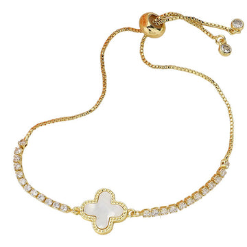Gol-Mother Of Pearl Quatrefoil Pointed Brass Metal Round CZ Stone Adjustable Pull Tie Bracelet is a stunning piece of jewelry that combines elegance and versatility. Crafted with a beautiful mother of pearl quatrefoil design, it features a brass metal round adorned with sparkling CZ stones. 
