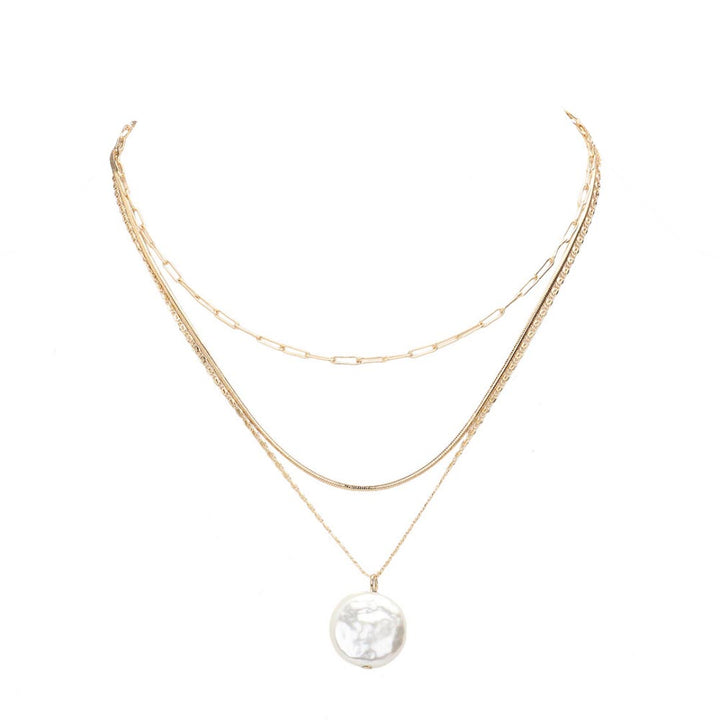 This Pearl Pendant Gold Triple Layered Necklace is the perfect "pearla" of jewelry, and a sure way to level up any look. The triple chain layers will make you feel like royalty, with their classic elegance and timeless charm. Perfect Birthday Gift, Anniversary Gift, Regalo Cumpleanos, Regalo Navidad, Valentine's Day Gift