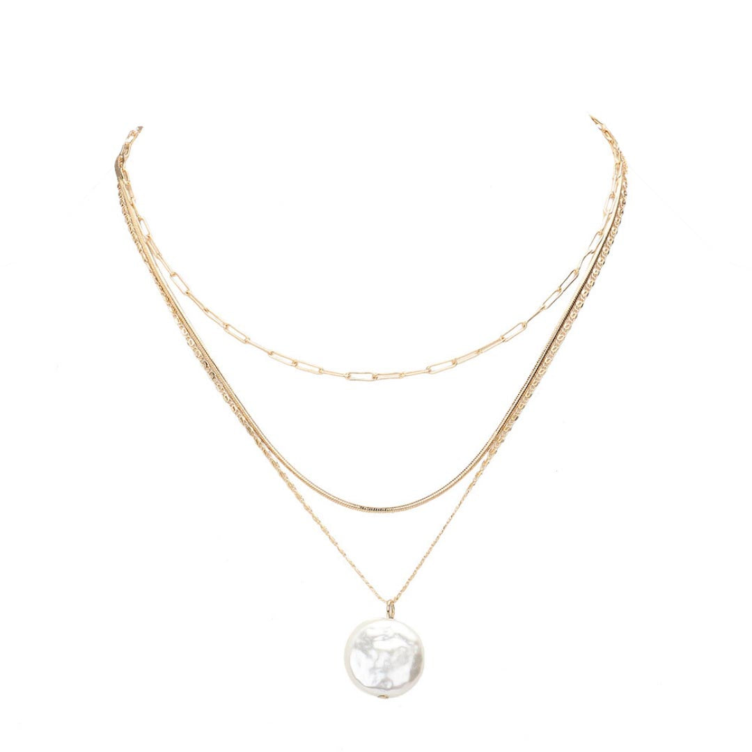 This Pearl Pendant Gold Triple Layered Necklace is the perfect "pearla" of jewelry, and a sure way to level up any look. The triple chain layers will make you feel like royalty, with their classic elegance and timeless charm. Perfect Birthday Gift, Anniversary Gift, Regalo Cumpleanos, Regalo Navidad, Valentine's Day Gift