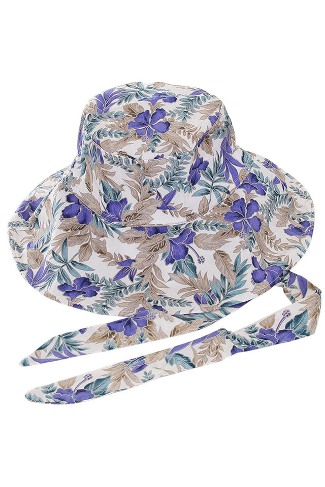 Blue HIBISCUS CHIN TIE BUCKET HAT delivers superior sun protection with practical elegance. The strategic chin tie mechanism ensures stability during activities, while the premium fabric construction offers durability without compromising breathability. The distinctive hibiscus pattern elevates this functional accessory into a statement piece for discerning outdoor enthusiasts. 