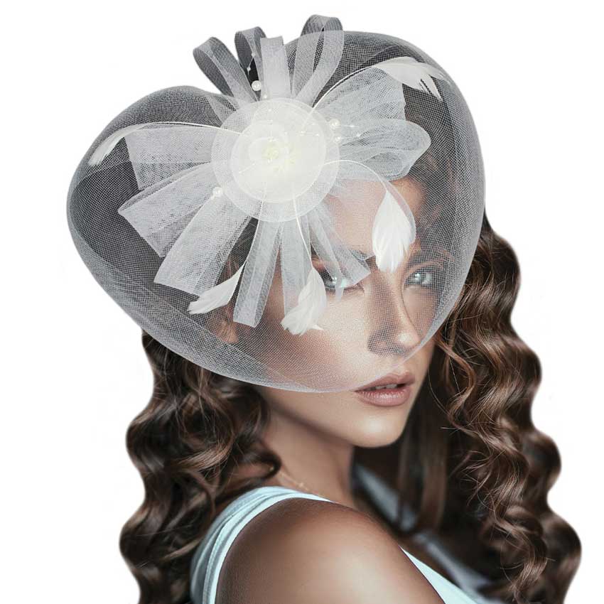 White Pearl Feather Mesh Flower Fascinator Headband, this accessory adds romance to any look. Made with delicate mesh and detailed with a feather flower and pearl accents, it is sure to become your go-to accessory for special occasions or any event. Perfect gift for birthdays, anniversaries, or any other significant day.