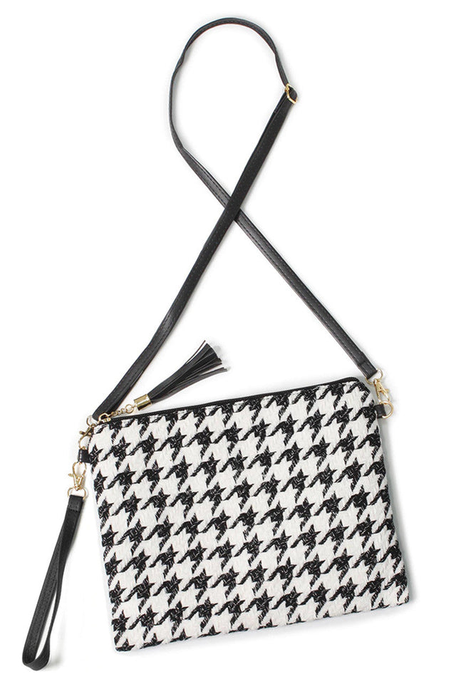Houndstooth Pattern Crossbody Bag blends classic design with modern practicality. Featuring a distinctive houndstooth print, this bag offers a sophisticated look suitable for various occasions. Its compact size and adjustable strap provide comfortable, hands-free wear, while secure closures ensure your belongings stay protected. Crafted with attention to detail, it’s an ideal accessory for those seeking timeless style paired with everyday functionality. 
