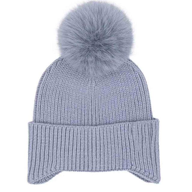 Ice Blue KIDS Ear Flap Pom C.C Beanie combines functional design with comfort to protect children from cold weather. Featuring extended ear flaps for added warmth and a soft pom-pom detail, this beanie is crafted from high-quality materials that provide insulation without sacrificing breathability. Its secure fit ensures it stays in place during active play, making it a reliable accessory for winter outings. 