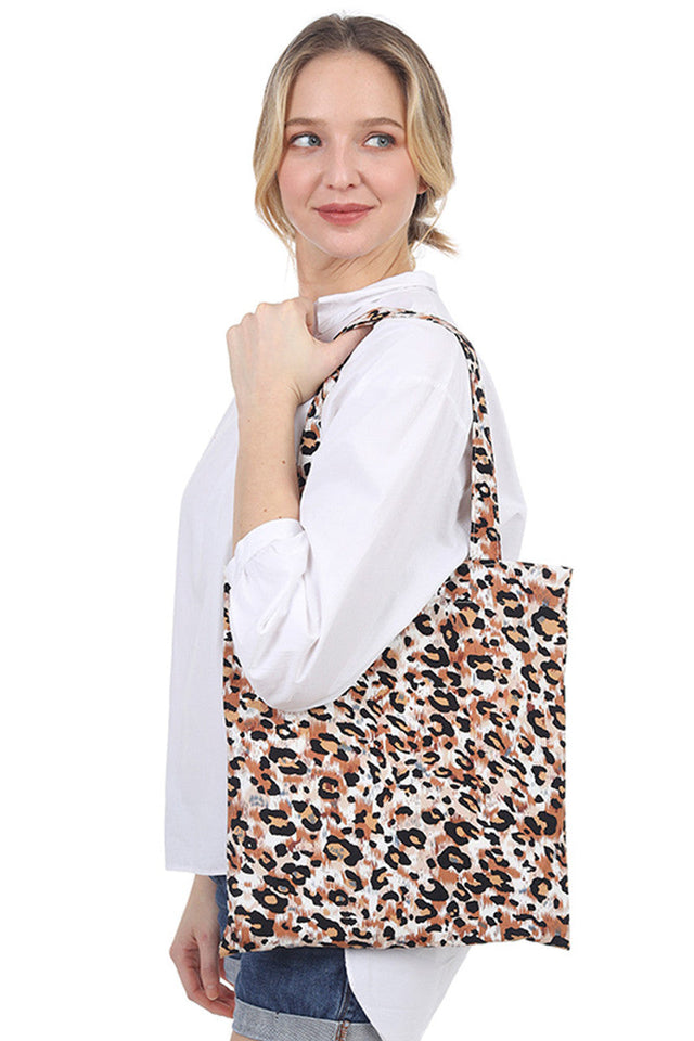 Leopard Print Viscose Bag combines stylish animal print with lightweight, durable viscose fabric, offering both fashion and functionality. Its spacious design accommodates daily essentials, while the soft material ensures comfortable wear. Perfect for adding a bold statement to any outfit, this bag balances trend-forward aesthetics with practical use. 