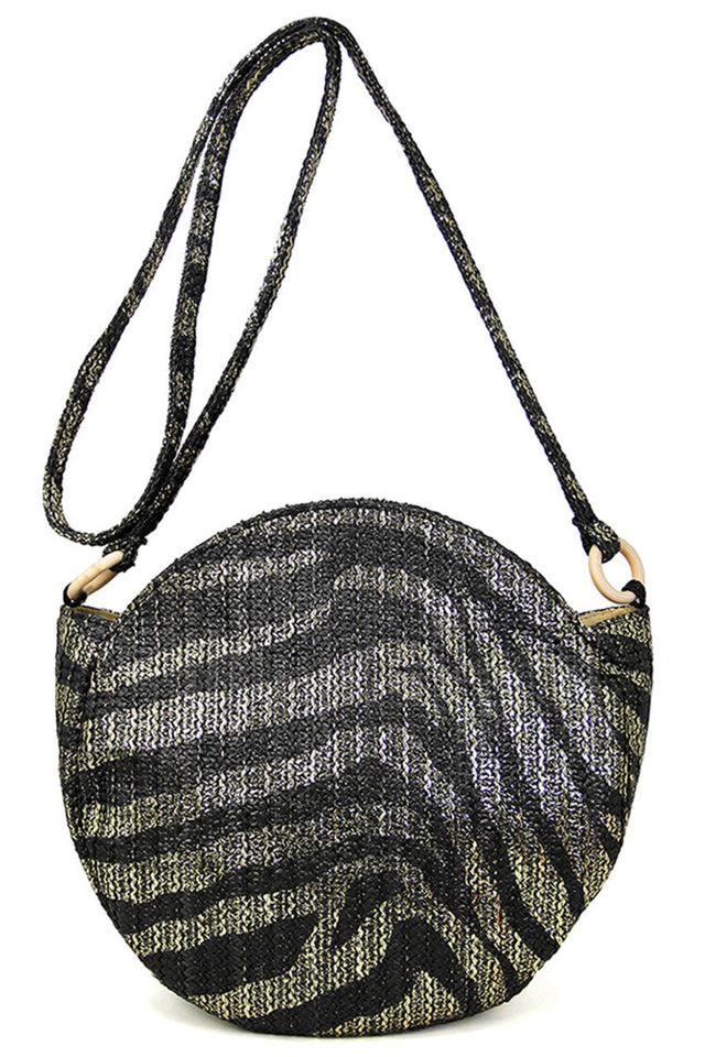 Metallic Zebra Print Round Bag offers a sophisticated blend of bold design and expert craftsmanship. Featuring a striking metallic zebra pattern on a sleek round shape, this bag provides a distinctive look while maintaining a practical size for daily essentials. Ideal for those seeking a statement accessory that combines contemporary style with reliable functionality.