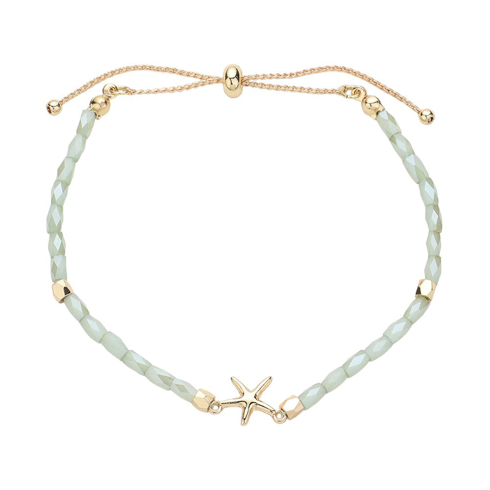Mint Metal Starfish Pointed Faceted Beaded Pull Tie Cinch Bracelet! Perfect for any occasion, this bracelet features a stunning metal starfish charm and intricately faceted beads that add a touch of elegance and style. Elevate your look and make a statement with this unique and versatile bracelet.
