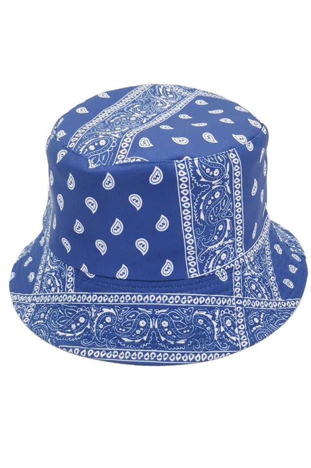Blue PAISLEY REVERSIBLE BUCKET HAT offers dual-wearing options with its distinctive paisley pattern on one side and a complementary solid reverse. Constructed with premium materials for superior shape retention and comfort. The versatile silhouette provides excellent sun protection while delivering a sophisticated aesthetic that transitions seamlessly between casual and refined settings. 